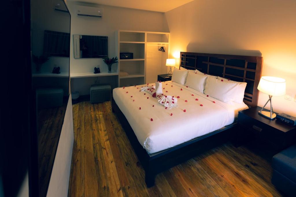 Postel nebo postele na pokoji v ubytování La Placita Inn