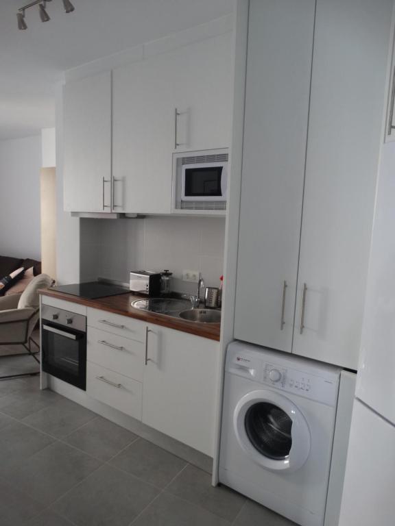 Kuchyňa alebo kuchynka v ubytovaní Málaga Apartamentos - Jinetes, 23