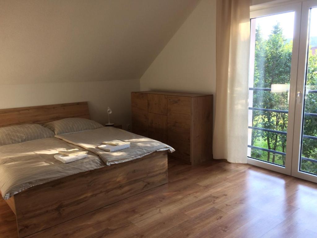 Postel nebo postele na pokoji v ubytování Apartments ADANA