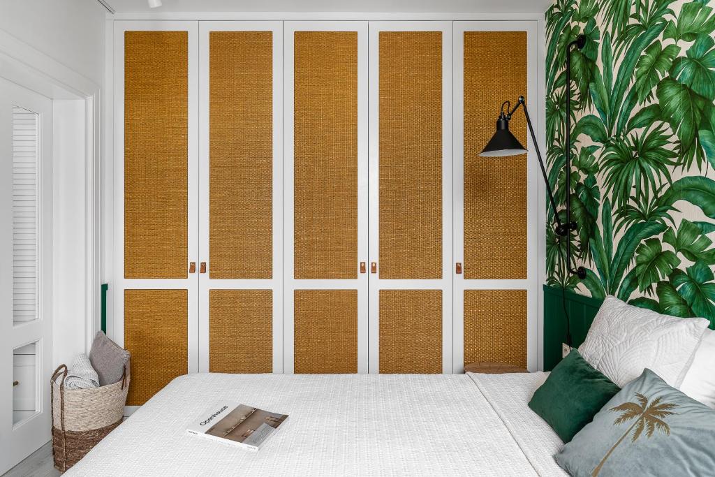 Posteľ alebo postele v izbe v ubytovaní Apartament Ap175