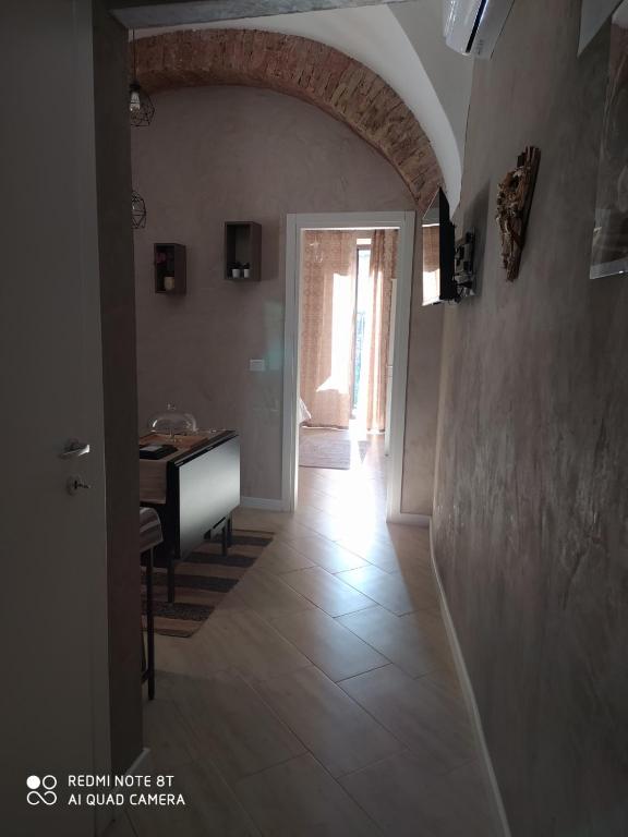 Telewizja i/lub zestaw kina domowego w obiekcie Cortile Pantaleone Holiday Home