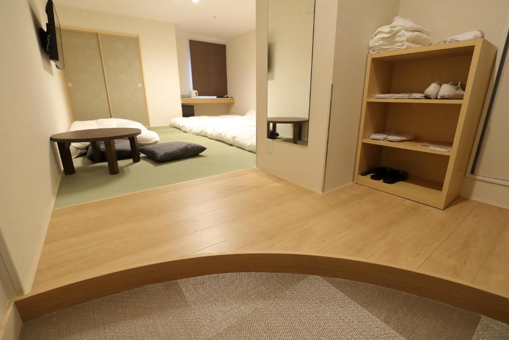 TV a/nebo společenská místnost v ubytování Osaka Teikoku Hotel