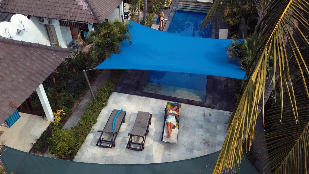 Bazén v ubytování Gili Palms Resort nebo v jeho okolí