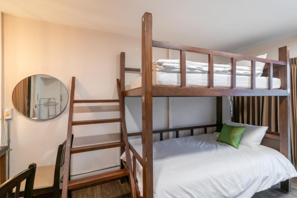 Phobphan Hostelにあるベッド