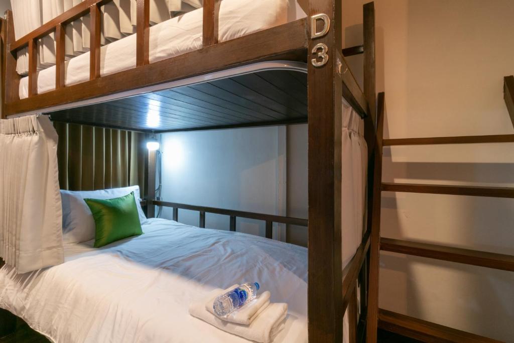 Phobphan Hostelにあるベッド