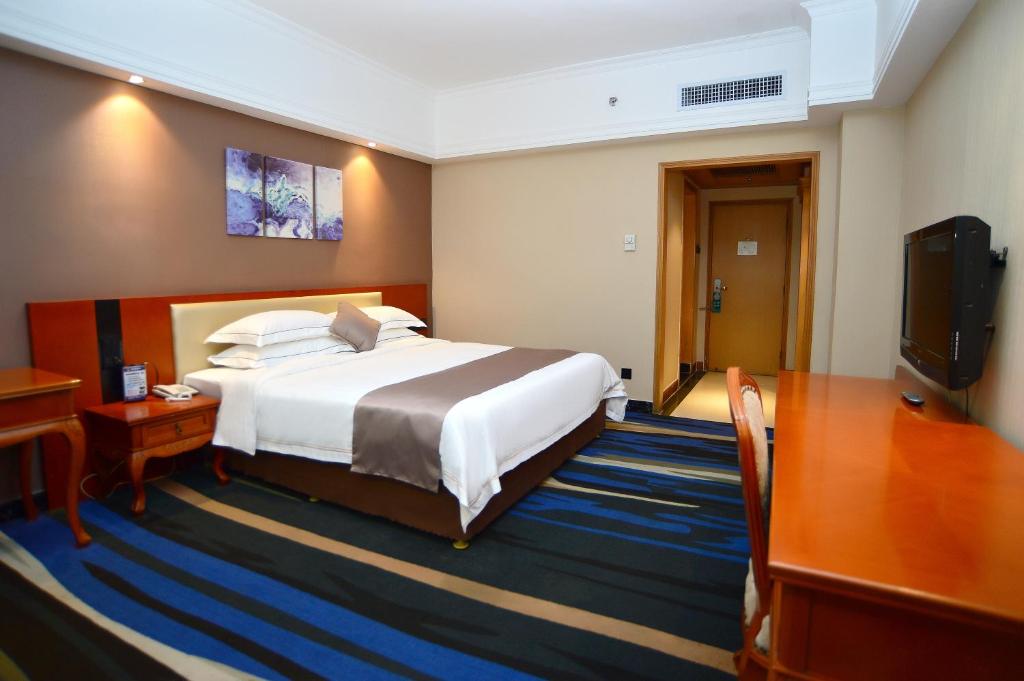 TV a/nebo společenská místnost v ubytování Shenzhen Kaili Hotel, Guomao Shopping Mall