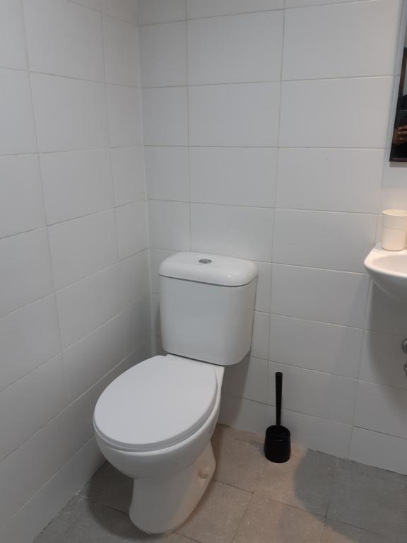 Koupelna v ubytování UROOMS Senayan