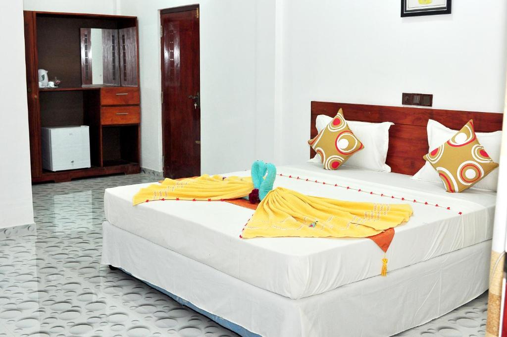 Postel nebo postele na pokoji v ubytování Sea View Villa Bentota, Induruwa