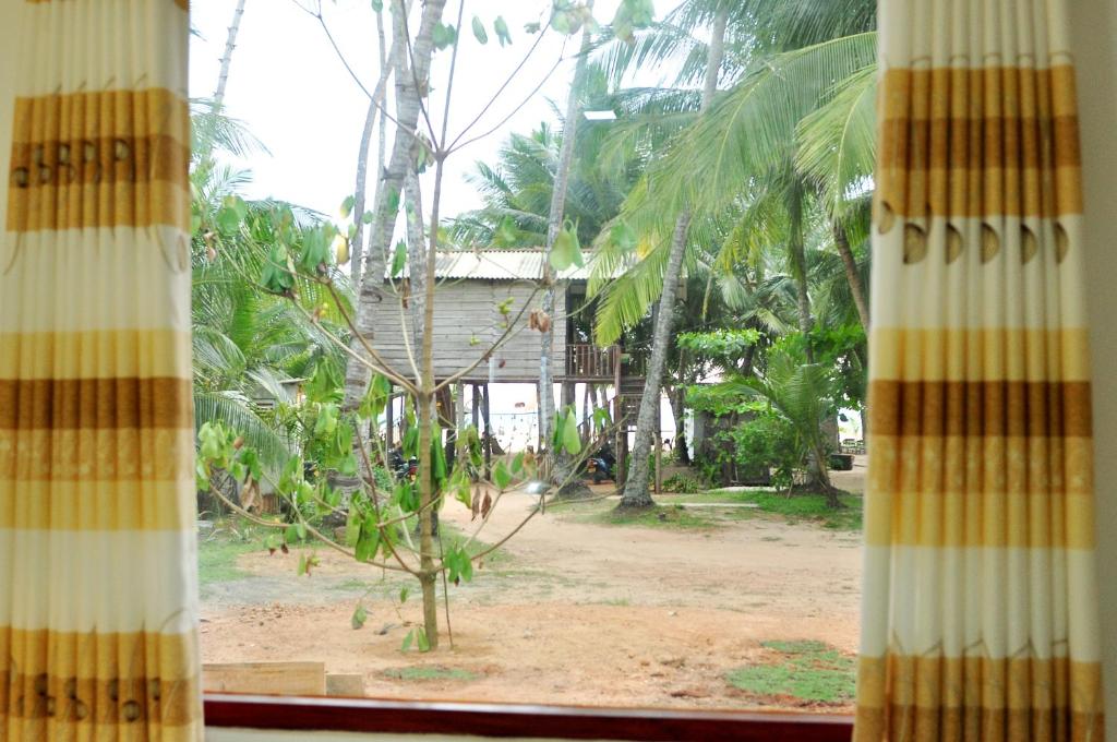 Zahrada ubytování Sea View Villa Bentota, Induruwa