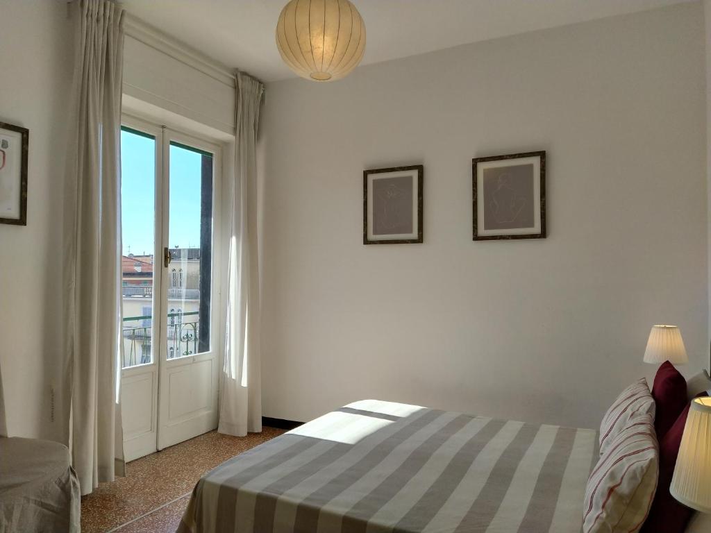 A bed or beds in a room at Bianca House Sea View