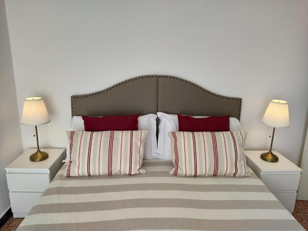 A bed or beds in a room at Bianca House Sea View