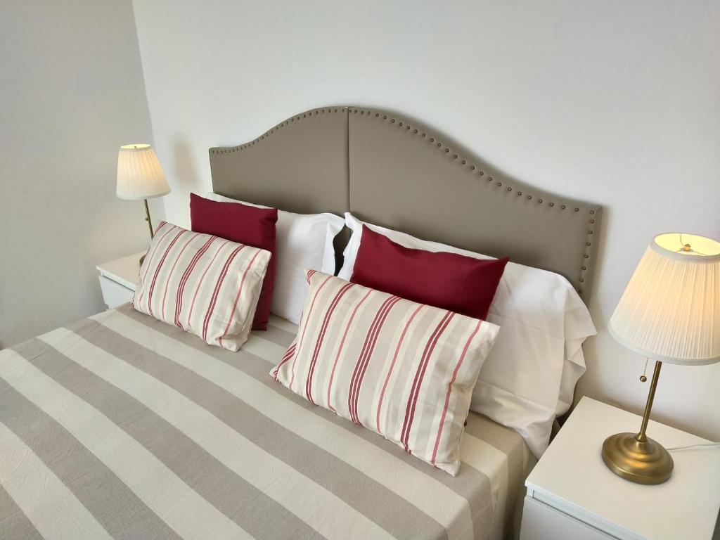 A bed or beds in a room at Bianca House Sea View