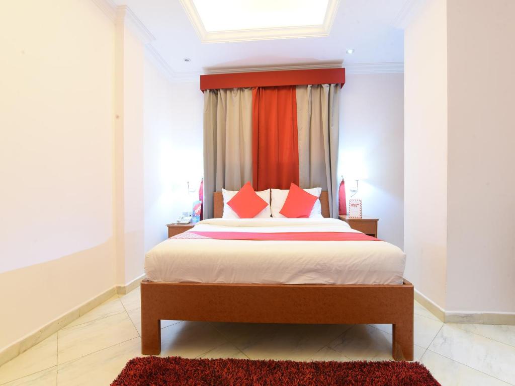 Postel nebo postele na pokoji v ubytování Mirage Hotel