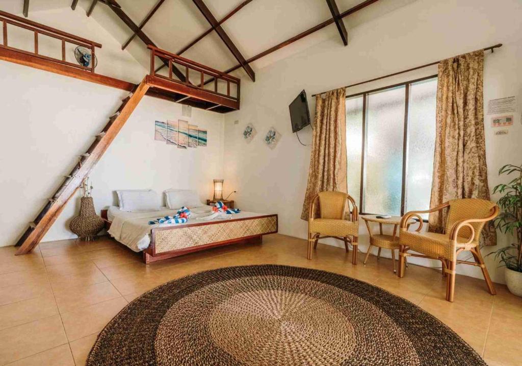 Posezení v ubytování Romantic Beach Villas