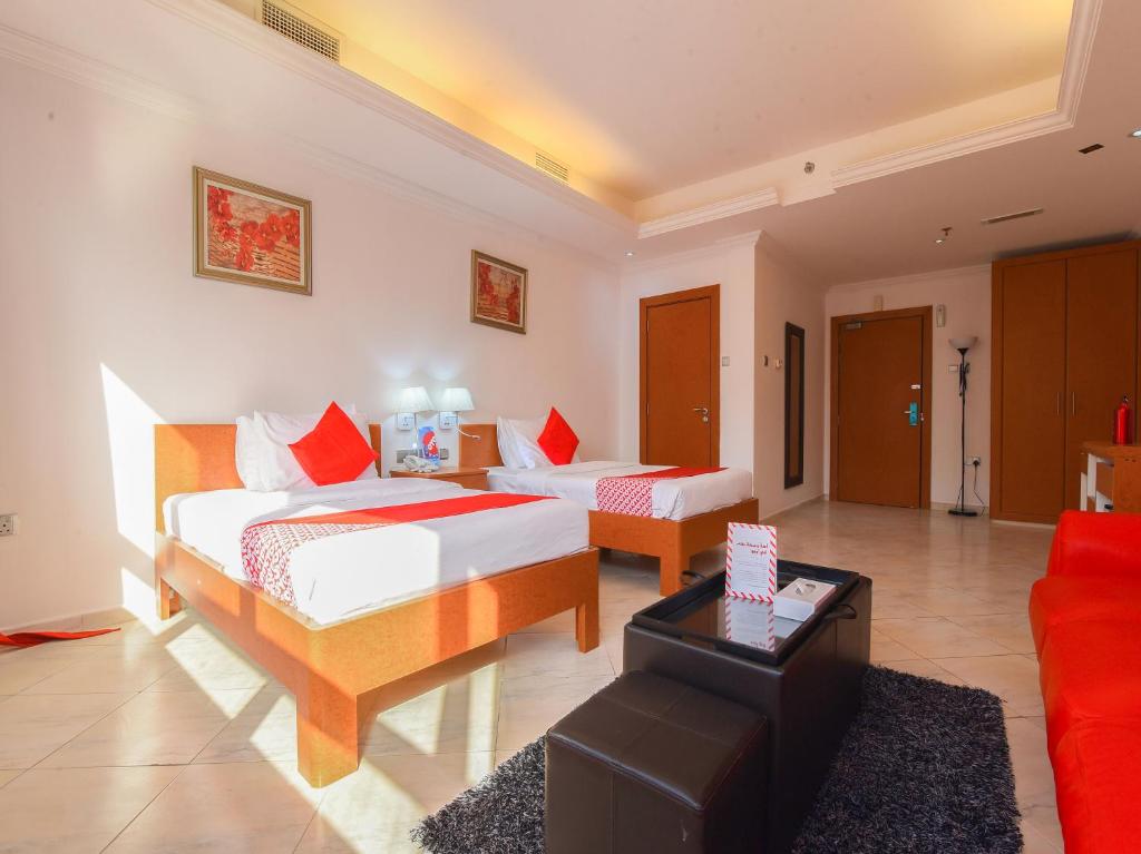 Postel nebo postele na pokoji v ubytování Mirage Hotel
