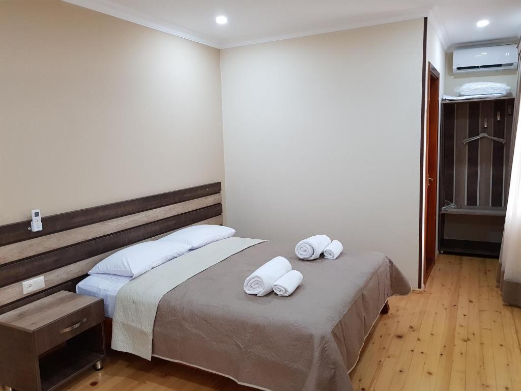 Postel nebo postele na pokoji v ubytování Hotel Villa