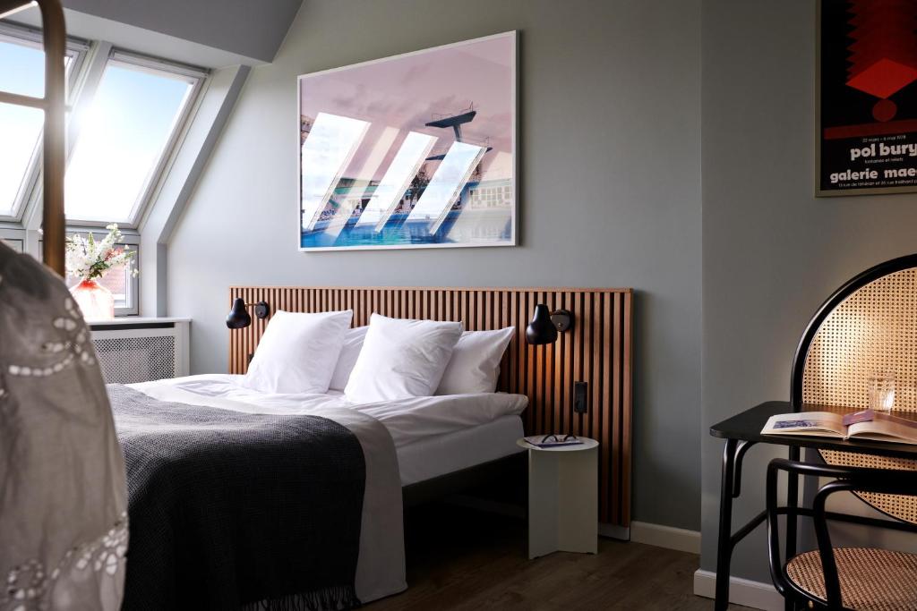 Postel nebo postele na pokoji v ubytování Coco Hotel