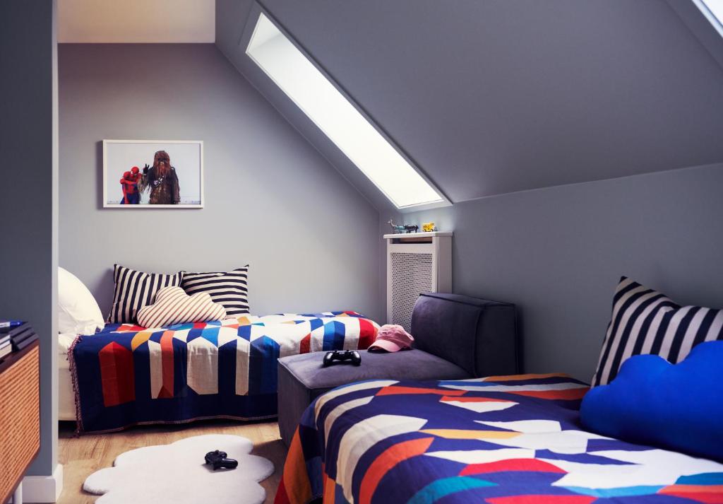 Postel nebo postele na pokoji v ubytování Coco Hotel