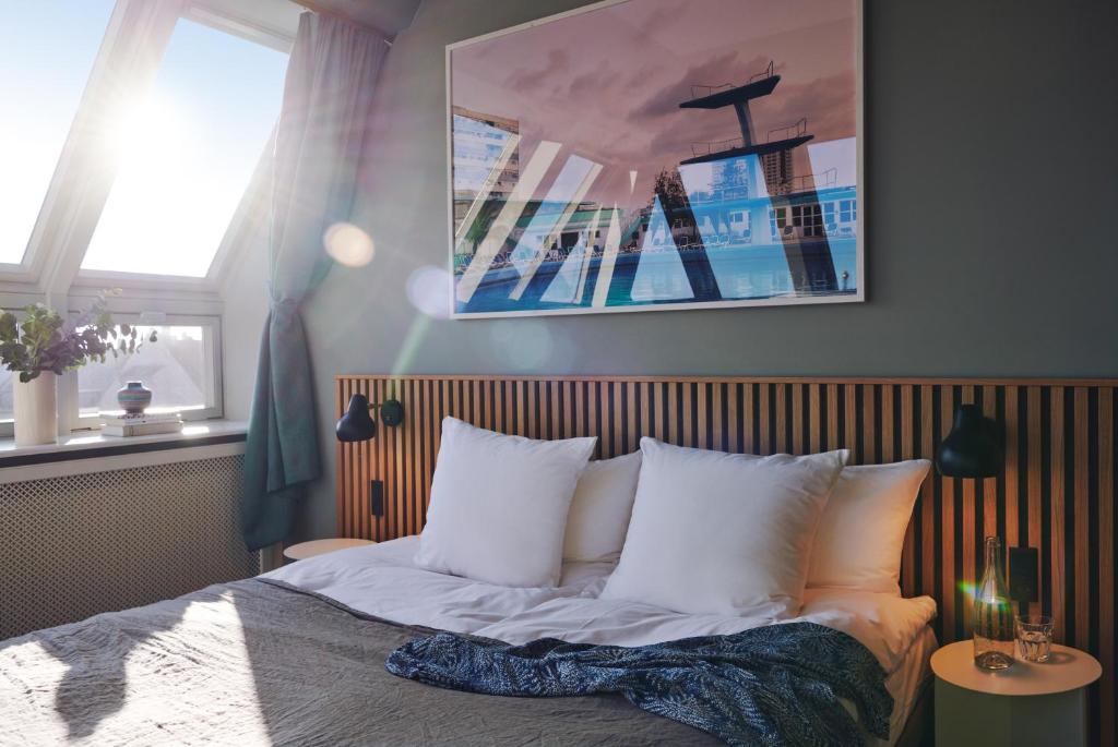 Postel nebo postele na pokoji v ubytování Coco Hotel