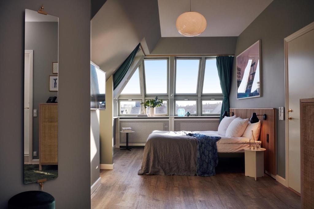 Postel nebo postele na pokoji v ubytování Coco Hotel