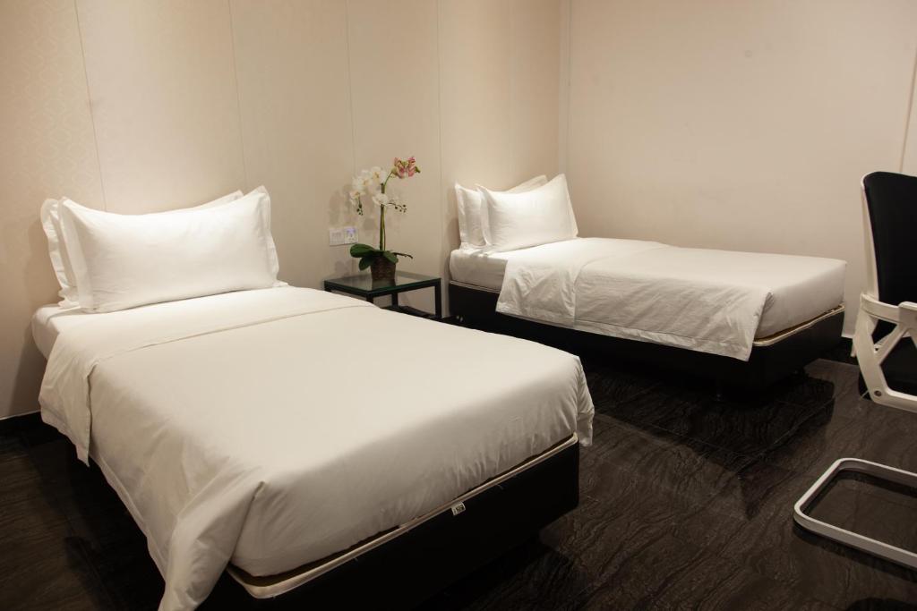 Postel nebo postele na pokoji v ubytování M Design Hotel @ Taman Pertama