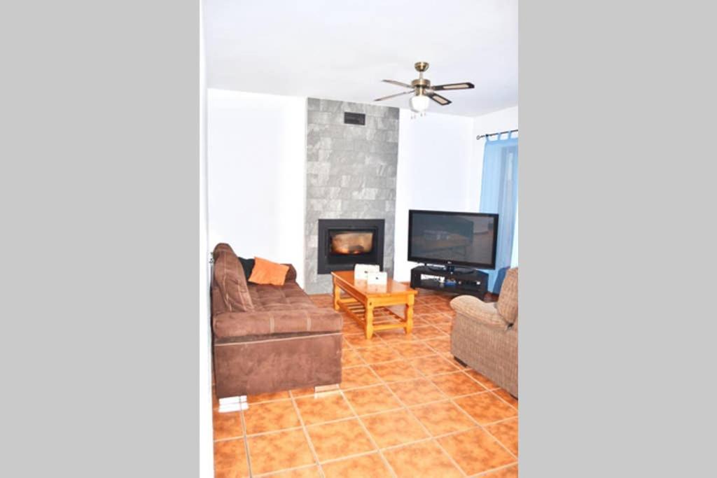 A television and/or entertainment centre at TPA - Les Tres Cales - 1