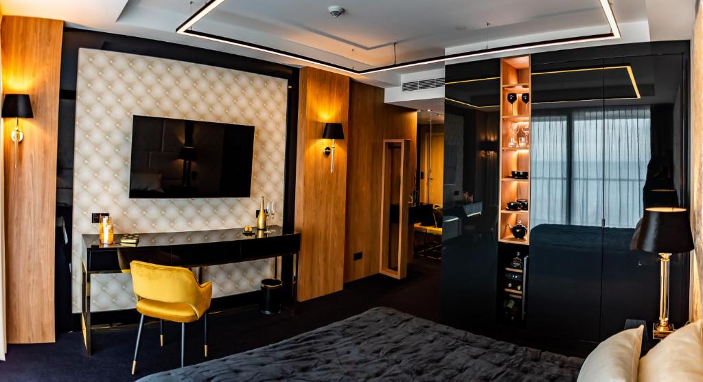 Televízia a/alebo spoločenská miestnosť v ubytovaní Golden Eye Apartament Seaside Park