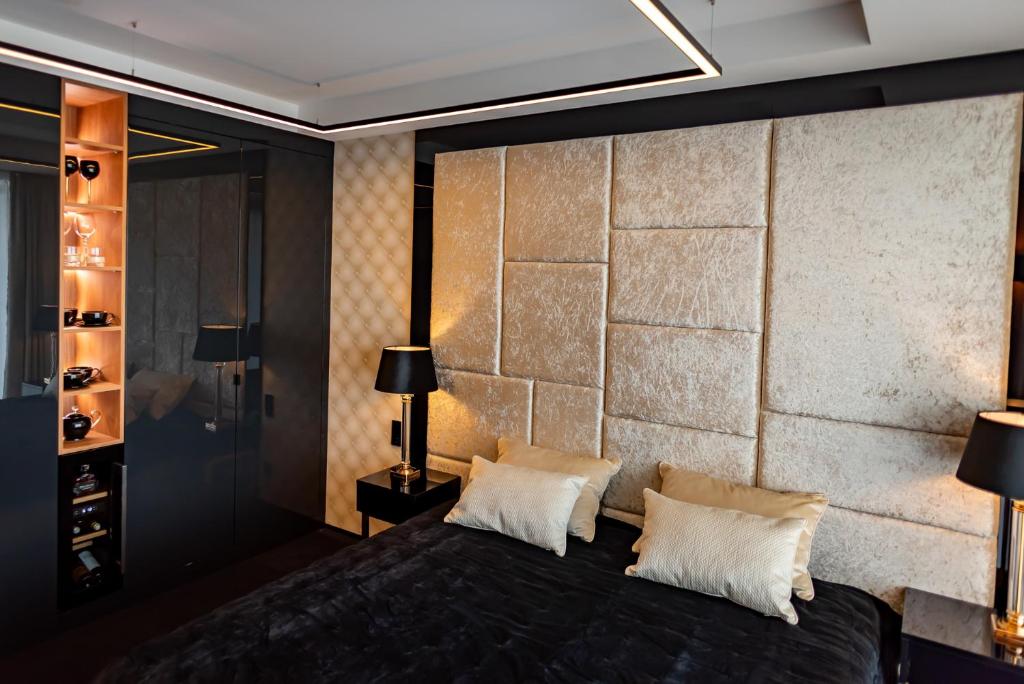 Posteľ alebo postele v izbe v ubytovaní Golden Eye Apartament Seaside Park