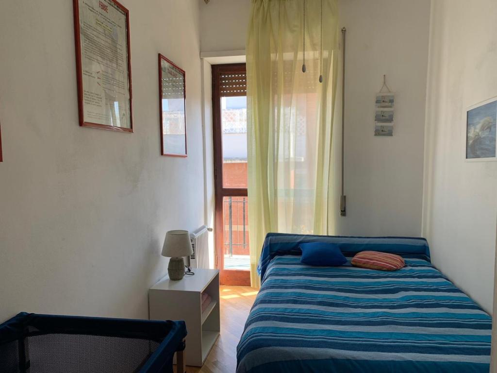 Posteľ alebo postele v izbe v ubytovaní Casa Daniele