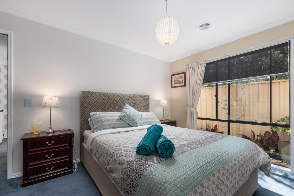 
A bed or beds in a room at North Essendon B & B Melbourne Airport
