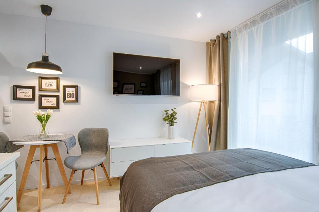 Voodi või voodid majutusasutuse Business Hotel Maier toas