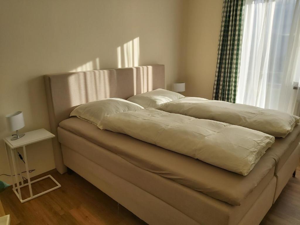 Postel nebo postele na pokoji v ubytování Haus Fernblick