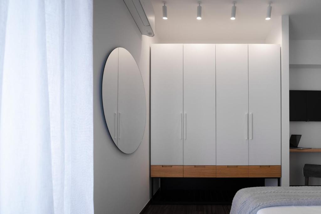 Posteľ alebo postele v izbe v ubytovaní The H Experience Boutique Apartment Koules Fortress Heraklion