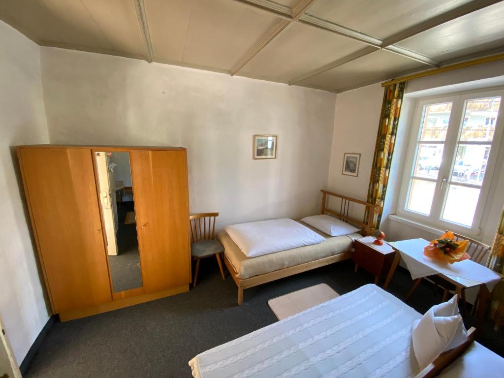 Postel nebo postele na pokoji v ubytování Gasthof Albergo Ressmair
