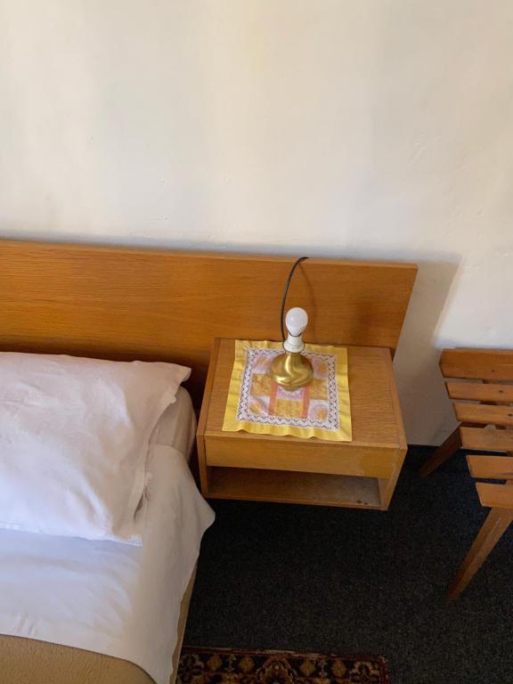 Postel nebo postele na pokoji v ubytování Gasthof Albergo Ressmair