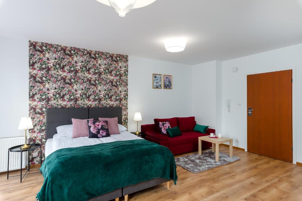Posteľ alebo postele v izbe v ubytovaní Sleepway Apartments - English Dream