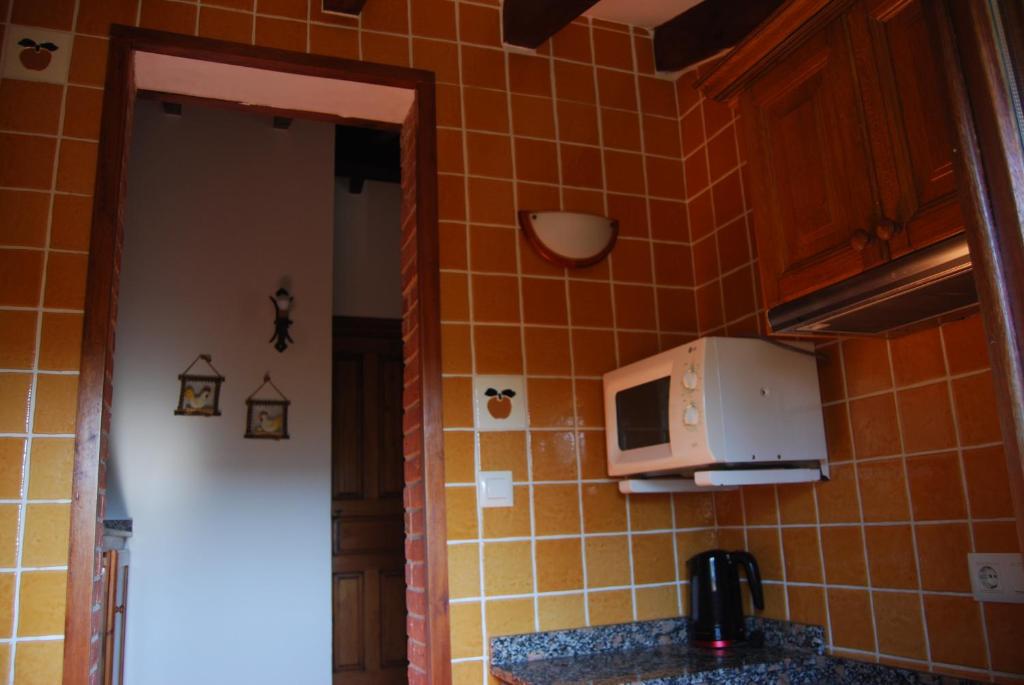 Kuchnia lub aneks kuchenny w obiekcie Apartamentos El Perujo