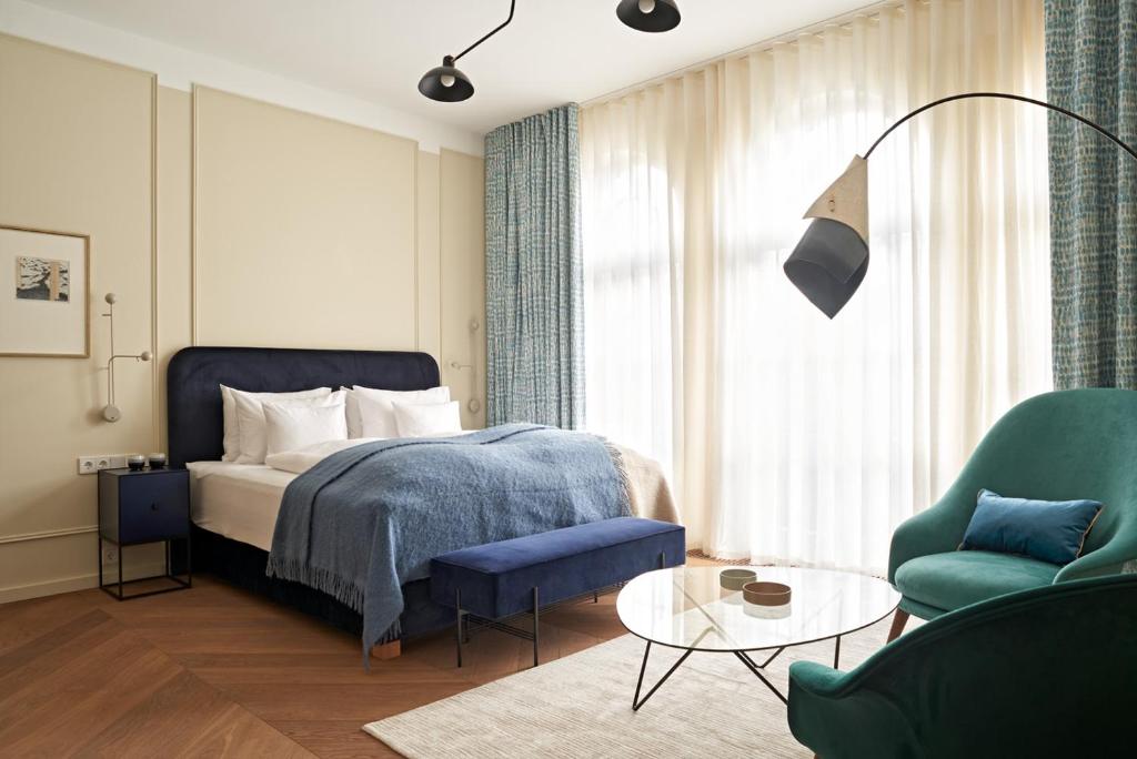 Postel nebo postele na pokoji v ubytování Bagatelle Gardenhouse