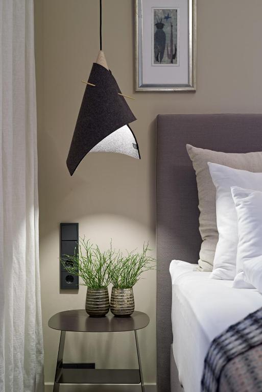 Postel nebo postele na pokoji v ubytování Bagatelle Gardenhouse