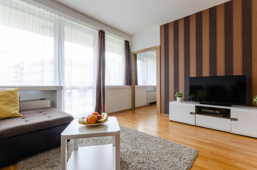 TV a/nebo společenská místnost v ubytování Flat at the Danube with wellness