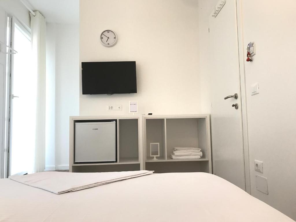 Postel nebo postele na pokoji v ubytování Aleksi rooms
