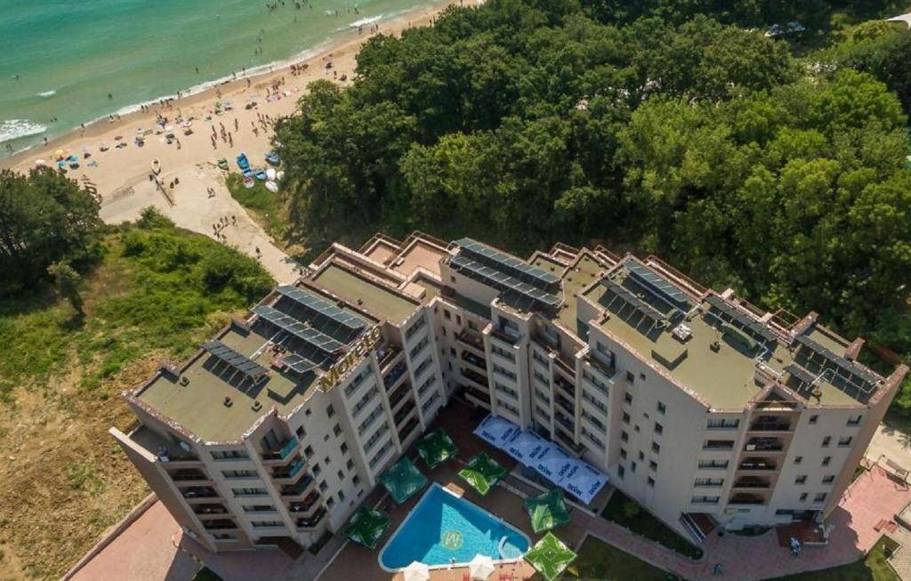 an aerial view of a hotel and the beach at Moreto Seaside Aparthotel in Obzor