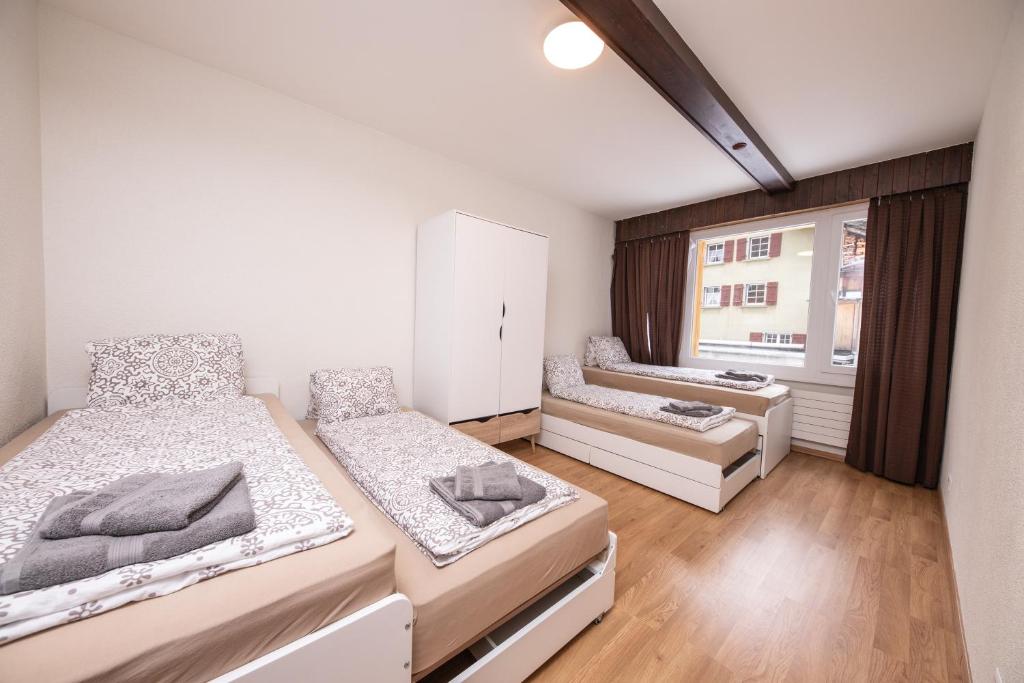 Postel nebo postele na pokoji v ubytování Haus Astoria