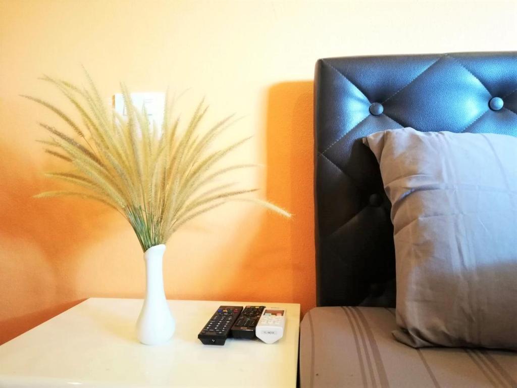 Postel nebo postele na pokoji v ubytování Phurafa Resort
