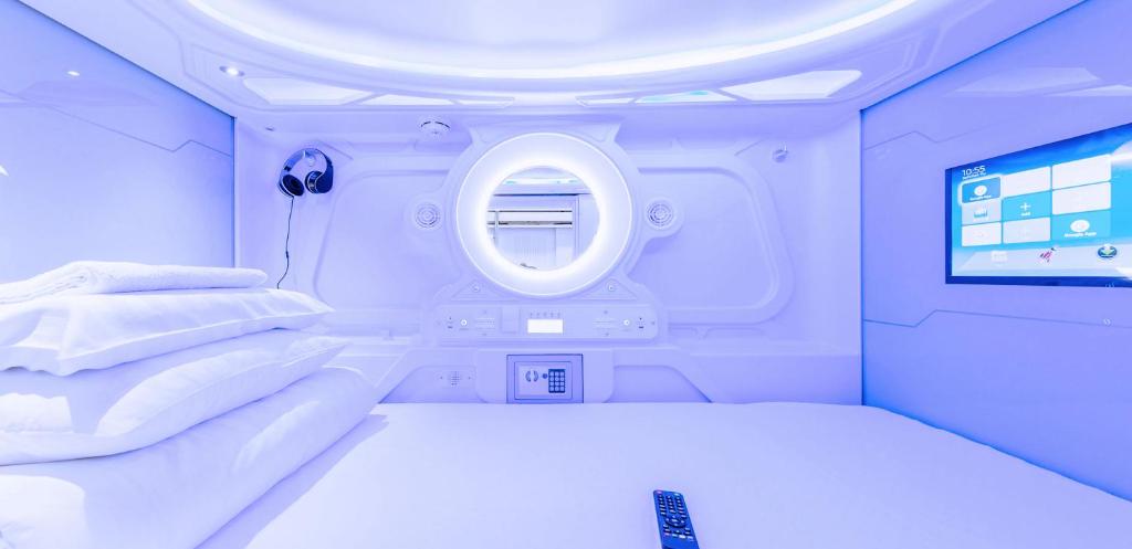 Postel nebo postele na pokoji v ubytování Capsule Hostels Tallinn