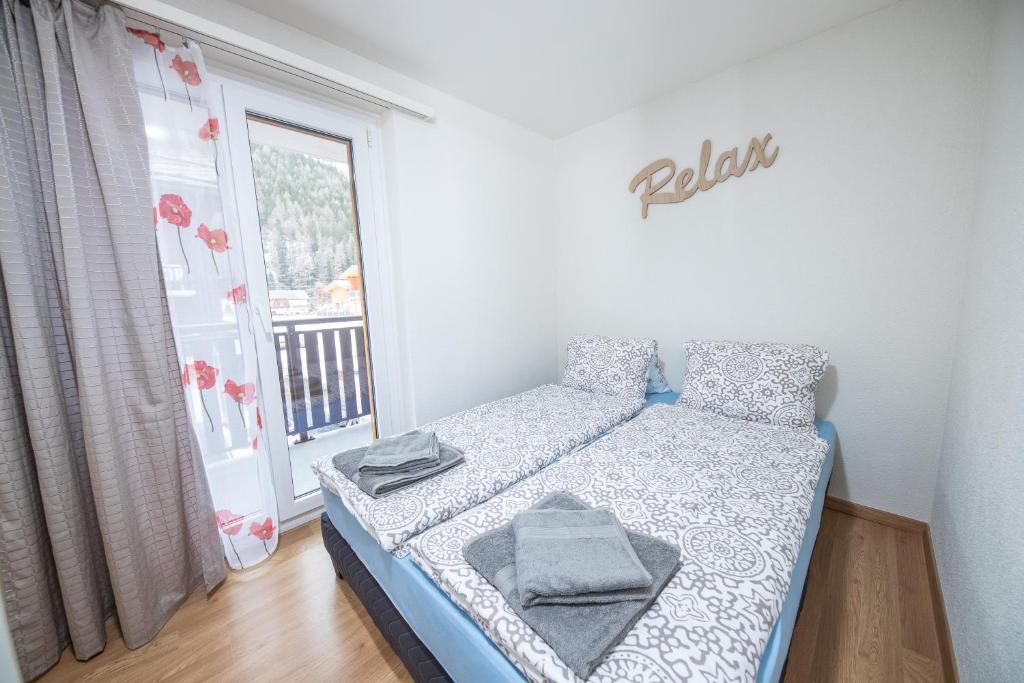 Postel nebo postele na pokoji v ubytování Haus Astoria