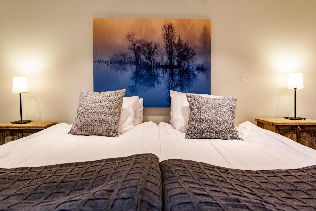 Postel nebo postele na pokoji v ubytování Hotell Breda Blick