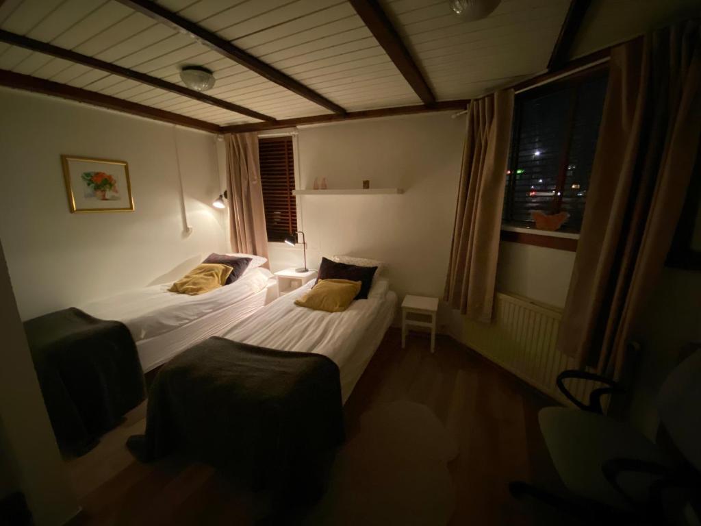Postel nebo postele na pokoji v ubytování Perfect Apartment in the Heart of Reykjavík