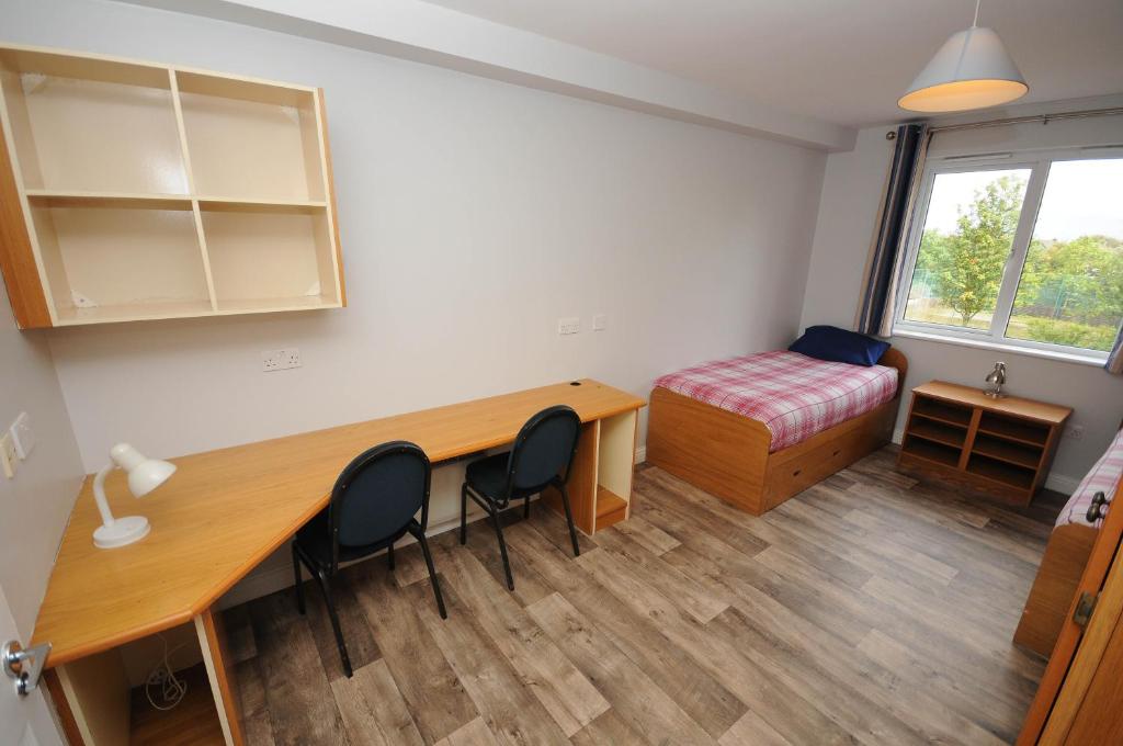 Postel nebo postele na pokoji v ubytování Dunaras Holiday Village