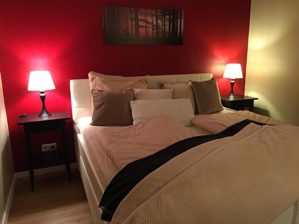 Säng eller sängar i ett rum på Ferienwohnung Gute Zeit Hahnenklee